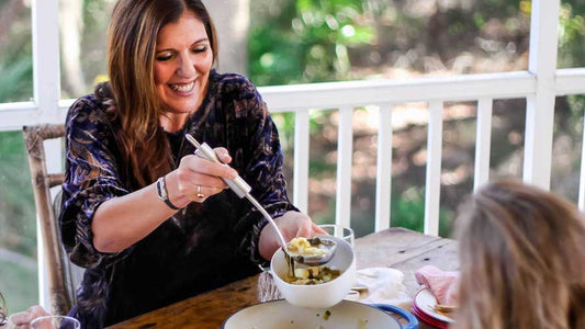 Dr Anna Cabeca serving a healthy meal
