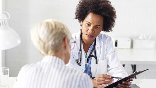 Woman consulting with her doctor