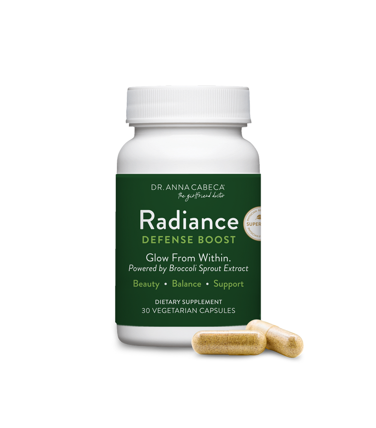 Supplement bottle labeled 'Radiance Defense Boost' by Dr. Anna Cabeca on a white background