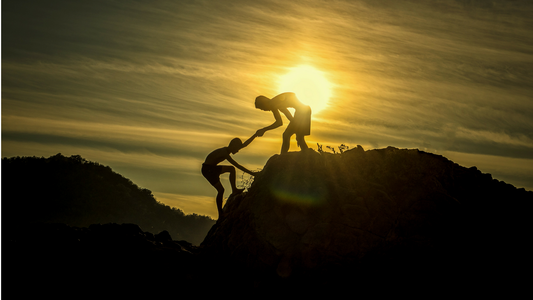 Climbing a mountain with help from a friend