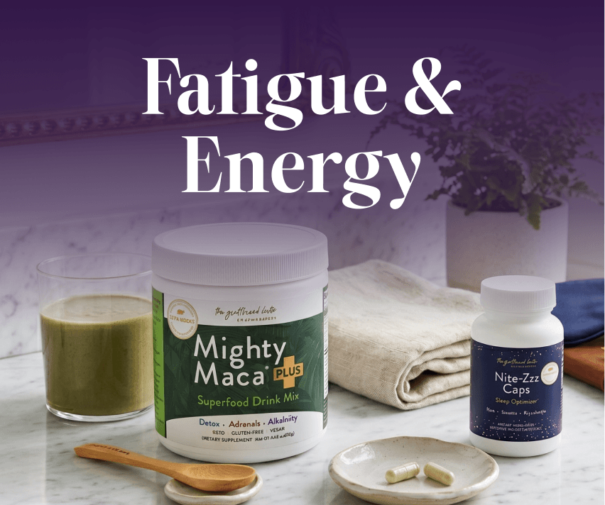 Supplement products for fatigue and energy on a table with a purple background
