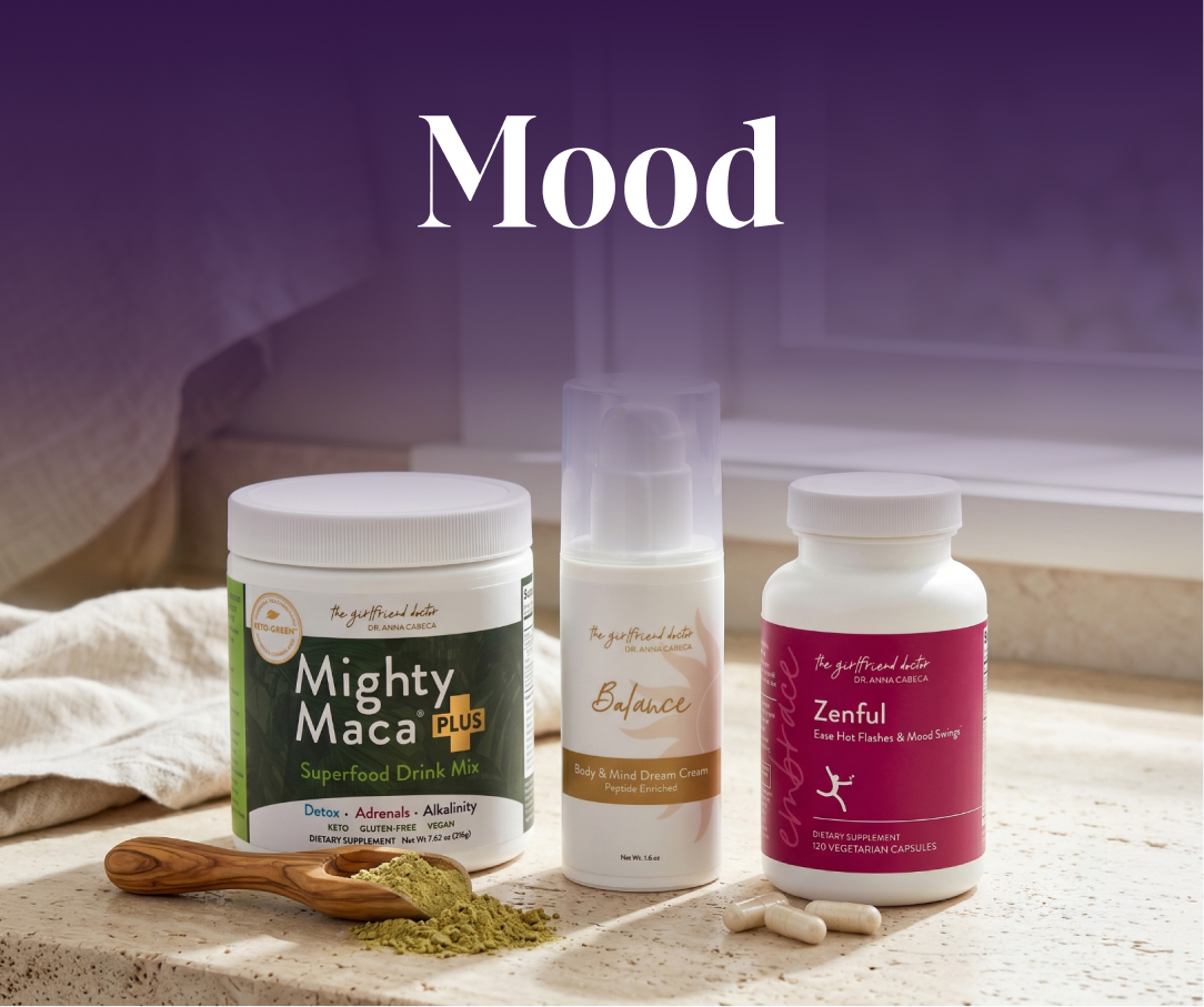 Three health products labeled 'Mighty Maca Plus', 'Balance', and 'Zenful' on a wooden surface with a blurred background.