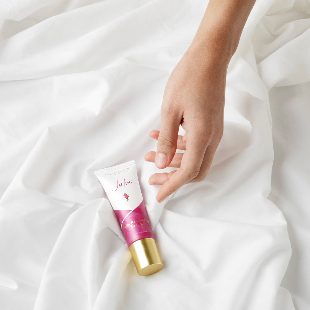 Hand reaching for Julva full tube 