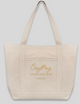 Canvas tote bag printed with "Oxyplay. Laugh. Love. Give. dranna.com"